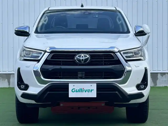 トヨタ ハイラックス Z 香川県 2021(令3)年 2.6万km スーパーホワイトⅡ 登録時走行距離：25681km/トヨタセーフティーセンス/→プリクラッシュセーフティ/→先行車発進アラート/→レーントレーシングアシスト/→レーダークルーズコントロール/→レーンキープアシスト/ALPINE11型ディスプレイオーディオ/→HDMI接続可能/→AppleCarPlay/AndroidAuto対応/バックカメラ/革巻きステアリング/ステアリングリモコン/ダウンヒルアシストコントロール/LEDヘッドライト/オートハイビーム/オートライト/ドライブレコーダー/純正17インチアルミホイール/スペアキー/スマートキー/プッシュスタート