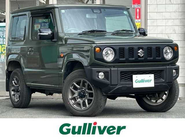スズキ ジムニー XC 岩手県 2019(令1)年 1.5万km ジャングルグリーン ・4WD/・社外ナビ（CN-RZ743W）/・フルセグTV/・AM/FM/CD/DVD/SD/Bluetooth/・バックカメラ/・プッシュスタート/・スマートキー/・スペアキー1本/・横滑り防止/・ダウンヒルコントロール/・コーナーセンサー/・シートヒーター（前席）/・クルーズコントロール（追従無し）/・ETC/・5速MT/・電格ウィンカーミラー/・革巻きステアリング/・純正ドアバイザー/・純正AW16インチ
