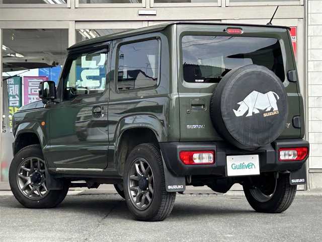 スズキ ジムニー XC 岩手県 2019(令1)年 1.5万km ジャングルグリーン ・4WD/・社外ナビ（CN-RZ743W）/・フルセグTV/・AM/FM/CD/DVD/SD/Bluetooth/・バックカメラ/・プッシュスタート/・スマートキー/・スペアキー1本/・横滑り防止/・ダウンヒルコントロール/・コーナーセンサー/・シートヒーター（前席）/・クルーズコントロール（追従無し）/・ETC/・5速MT/・電格ウィンカーミラー/・革巻きステアリング/・純正ドアバイザー/・純正AW16インチ