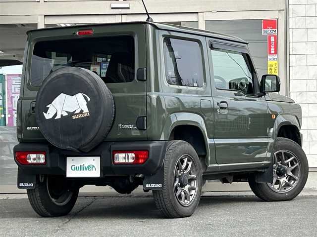 スズキ ジムニー XC 岩手県 2019(令1)年 1.5万km ジャングルグリーン ・4WD/・社外ナビ（CN-RZ743W）/・フルセグTV/・AM/FM/CD/DVD/SD/Bluetooth/・バックカメラ/・プッシュスタート/・スマートキー/・スペアキー1本/・横滑り防止/・ダウンヒルコントロール/・コーナーセンサー/・シートヒーター（前席）/・クルーズコントロール（追従無し）/・ETC/・5速MT/・電格ウィンカーミラー/・革巻きステアリング/・純正ドアバイザー/・純正AW16インチ