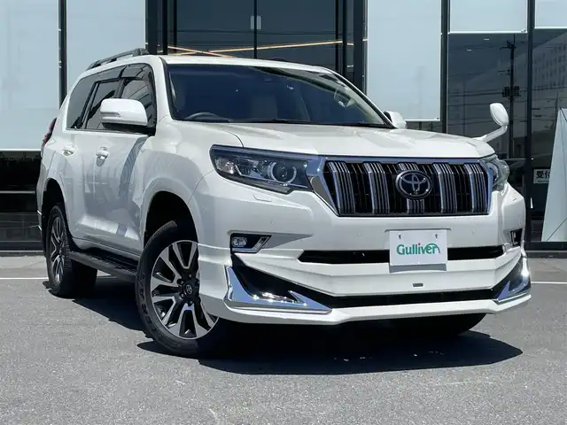 トヨタ ランドクルーザー プラド TX Lパッケージ 茨城県 2022(令4)年 5万km ホワイトパールクリスタルシャイン 純正ナビ/【AM・FM・DISC・TV・SD・BT・USB・HDMI】/サンルーフ/ルーフレール/モデリスタエアロ/パワーシート/シートヒーター/エアシート/４WD/センターデフロック/ダウンヒルアシストコントロール/レーダークルコン/ETC2.0/Bカメラ/前後ドラレコ/前後コーナーセンサー/ディーゼル車