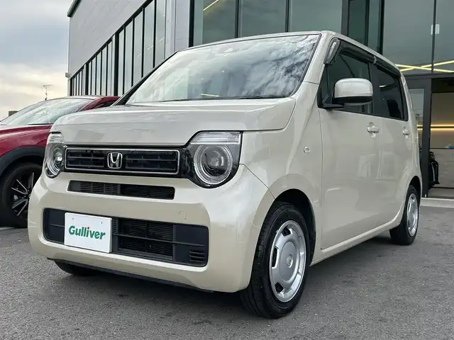 ホンダ Ｎ ＷＧＮ L ホンダセンシング 愛媛県 2020(令2)年 7.9万km プレミアムアイボリーパールⅡ 禁煙車/登録時走行距離：78776km/社外ナビ/CD/DVD/Bluetooth/バックカメラ/前部ドライブレコーダー/ビルトインＥＴＣ/衝突軽減システム/横滑り防止装置/レーンキープアシスト/レーダークルーズコントロール/Ｄ席シートヒーター/カーテンエアバッグ/ＬＥＤヘッドライト/オートライト/エンジンスタートボタン/スマートキー/純正フロアマット