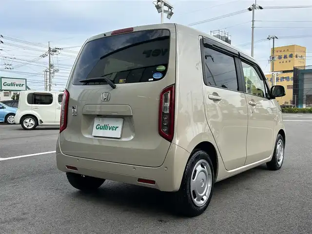 ホンダ Ｎ ＷＧＮ L ホンダセンシング 愛媛県 2020(令2)年 7.9万km プレミアムアイボリーパールⅡ 禁煙車/登録時走行距離：78776km/社外ナビ/CD/DVD/Bluetooth/バックカメラ/前部ドライブレコーダー/ビルトインＥＴＣ/衝突軽減システム/横滑り防止装置/レーンキープアシスト/レーダークルーズコントロール/Ｄ席シートヒーター/カーテンエアバッグ/ＬＥＤヘッドライト/オートライト/エンジンスタートボタン/スマートキー/純正フロアマット