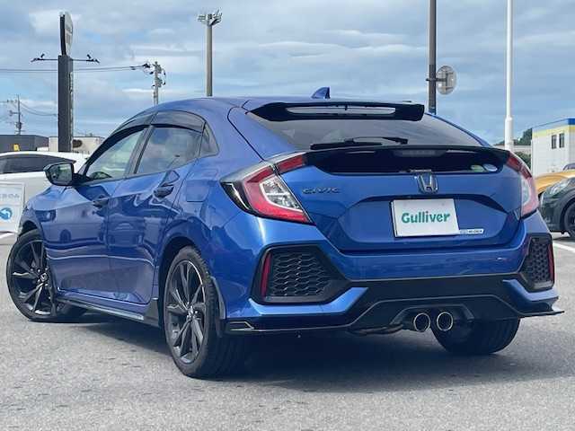 ホンダ シビック ハッチバック ホンダセンシング 長崎県 2018(平30)年 4.2万km ブリリアントスポーティブルーメタリック2トーン 無限エアロ/純正SDナビ/CD/DVD/BT/USB/フルセグTV/バックカメラ/ホンダセンシング/レーダークルーズコントロール/レーンキープアシスト/革調シートカバー/社外レーダー（ZERO 704V）/LEDオートライト/ビルトインETC/スペアキー/保証書/取扱説明書