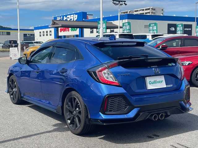 ホンダ シビック ハッチバック ホンダセンシング 長崎県 2018(平30)年 4.2万km ブリリアントスポーティブルーメタリック2トーン 無限エアロ/純正SDナビ/CD/DVD/BT/USB/フルセグTV/バックカメラ/ホンダセンシング/レーダークルーズコントロール/レーンキープアシスト/革調シートカバー/社外レーダー（ZERO 704V）/LEDオートライト/ビルトインETC/スペアキー/保証書/取扱説明書