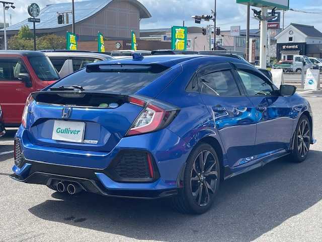 ホンダ シビック ハッチバック ホンダセンシング 長崎県 2018(平30)年 4.2万km ブリリアントスポーティブルーメタリック2トーン 無限エアロ/純正SDナビ/CD/DVD/BT/USB/フルセグTV/バックカメラ/ホンダセンシング/レーダークルーズコントロール/レーンキープアシスト/革調シートカバー/社外レーダー（ZERO 704V）/LEDオートライト/ビルトインETC/スペアキー/保証書/取扱説明書