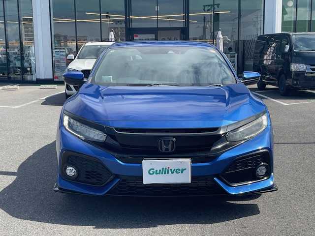 ホンダ シビック ハッチバック ホンダセンシング 長崎県 2018(平30)年 4.2万km ブリリアントスポーティブルーメタリック2トーン 無限エアロ/純正SDナビ/CD/DVD/BT/USB/フルセグTV/バックカメラ/ホンダセンシング/レーダークルーズコントロール/レーンキープアシスト/革調シートカバー/社外レーダー（ZERO 704V）/LEDオートライト/ビルトインETC/スペアキー/保証書/取扱説明書