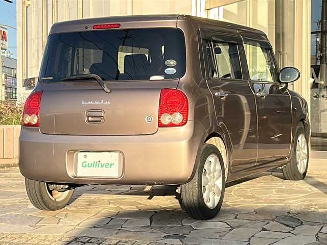 スズキ ラパン 10thアニバーサリーリミテッド 静岡県 2012(平24)年 9.4万km 茶 社外ナビ/シートヒーターD席/ETC/純正アルミホイール/純正フロアマット/スマートキー/スペアキー×１/プッシュスタート/オートエアコン/ハロゲンヘッドライト/Wエアバッグ/ABS/パワーウィンドウ/パワーステアリング