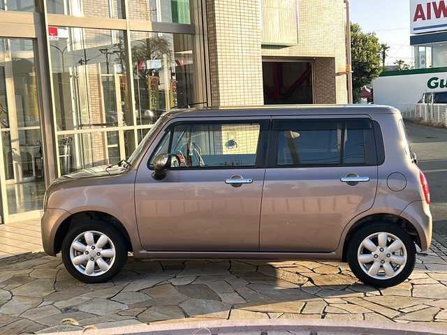 スズキ ラパン 10thアニバーサリーリミテッド 静岡県 2012(平24)年 9.4万km 茶 社外ナビ/シートヒーターD席/ETC/純正アルミホイール/純正フロアマット/スマートキー/スペアキー×１/プッシュスタート/オートエアコン/ハロゲンヘッドライト/Wエアバッグ/ABS/パワーウィンドウ/パワーステアリング