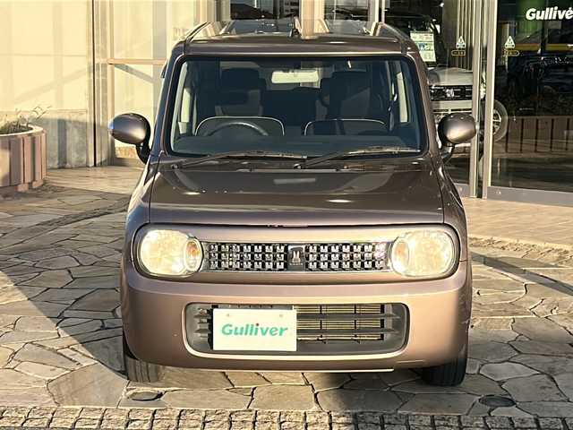 スズキ ラパン 10thアニバーサリーリミテッド 静岡県 2012(平24)年 9.4万km 茶 社外ナビ/シートヒーターD席/ETC/純正アルミホイール/純正フロアマット/スマートキー/スペアキー×１/プッシュスタート/オートエアコン/ハロゲンヘッドライト/Wエアバッグ/ABS/パワーウィンドウ/パワーステアリング