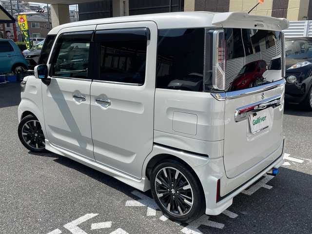 スズキ スペーシア カスタム HYBRID XS ターボ 宮崎県 2021(令3)年 2.5万km ピュアホワイトP ワンオーナー/社外メモリーナビ/フルセグTV/バックカメラ/ETC/セーフティサポート/・デュアルカメラブレーキサポート/・車線逸脱警報機能/・アダプティブクルーズコントロール/・誤発進抑制機能/・後方誤発進抑制機能/・後退時ブレーキサポート/・リアパーキングセンサー/両側パワースライドドア/ハーフレザーシート/D席シートヒーター/革巻きステアリング/パドルシフト/LEDヘッドランプ/オートライト/スペアキー×１/アイドリングストップ/ターボ/ローダウンサス/新車時整備手帳/　　【保証書】/取扱説明書
