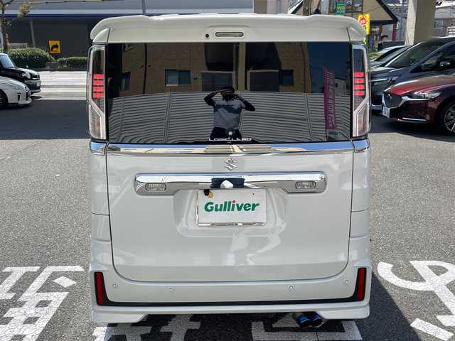 スズキ スペーシア カスタム HYBRID XS ターボ 宮崎県 2021(令3)年 2.5万km ピュアホワイトP ワンオーナー/社外メモリーナビ/フルセグTV/バックカメラ/ETC/セーフティサポート/・デュアルカメラブレーキサポート/・車線逸脱警報機能/・アダプティブクルーズコントロール/・誤発進抑制機能/・後方誤発進抑制機能/・後退時ブレーキサポート/・リアパーキングセンサー/両側パワースライドドア/ハーフレザーシート/D席シートヒーター/革巻きステアリング/パドルシフト/LEDヘッドランプ/オートライト/スペアキー×１/アイドリングストップ/ターボ/ローダウンサス/新車時整備手帳/　　【保証書】/取扱説明書