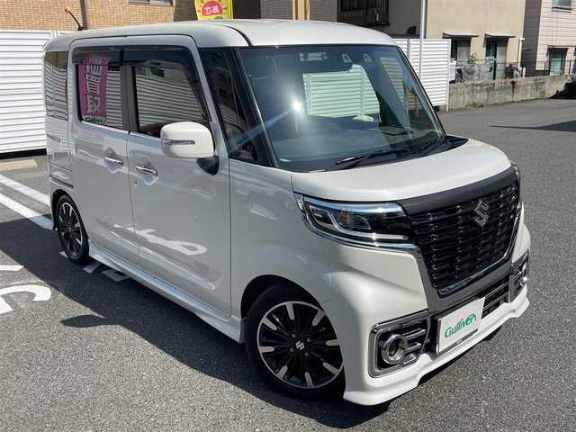 スズキ スペーシア カスタム HYBRID XS ターボ 宮崎県 2021(令3)年 2.5万km ピュアホワイトP ワンオーナー/社外メモリーナビ/フルセグTV/バックカメラ/ETC/セーフティサポート/・デュアルカメラブレーキサポート/・車線逸脱警報機能/・アダプティブクルーズコントロール/・誤発進抑制機能/・後方誤発進抑制機能/・後退時ブレーキサポート/・リアパーキングセンサー/両側パワースライドドア/ハーフレザーシート/D席シートヒーター/革巻きステアリング/パドルシフト/LEDヘッドランプ/オートライト/スペアキー×１/アイドリングストップ/ターボ/ローダウンサス/新車時整備手帳/　　【保証書】/取扱説明書