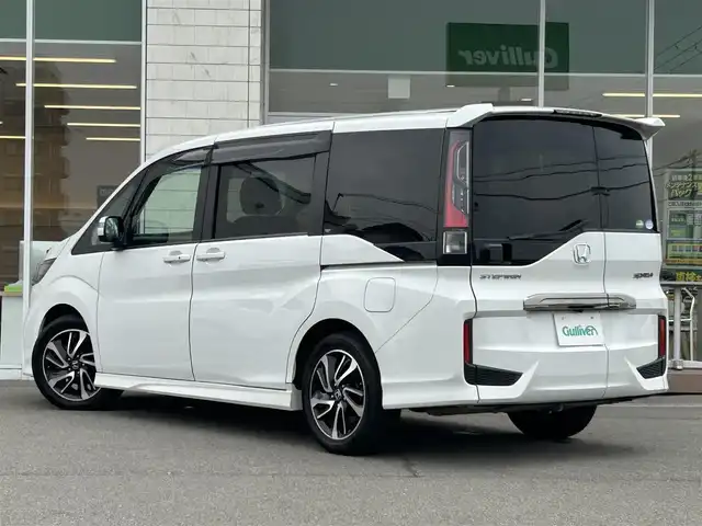 ホンダ ステップワゴン スパーダ クルスピセンシング 兵庫県 2018(平30)年 5.4万km プラチナホワイトパール 純正ナビ/ＥＴＣ/Bluetoothオーディオ/フルセグ/CD／DVD/バックカメラ/ステアリングリモコン/後部座席モニター（フリップダウン）/両側パワースライドドア/シートヒーター/Ｈｏｎｄａセンシング/クルーズコントロール（追従走行あり）/純正フロアマット