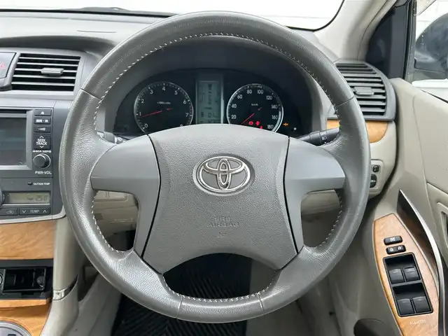 トヨタ プレミオ 1．8X Lパッケージ 静岡県 2007(平19)年 5.3万km シルバーM ワンオーナー/純正オーディオディスプレイ/　（AM/FM/CD）/バックカメラ/純正シートカバー/横滑り防止装置/純正ドアバイザー/純正フロアマット/スマートキー/ダブルサイドエアバッグ/オートライト/保証書/取扱説明書