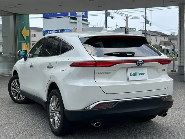トヨタ ハリアー ハイブリッド Z レザーパッケージ 兵庫県 2020(令2)年 4.8万km ホワイトパールクリスタルシャイン ワンオーナー/純正メーカーナビ/フルセグTV/Bluetooth/FM/AM/JBLサウンドシステム/パノラミックビューモニター/ビルトインETC2.0/デジタルインナーミラー/プリクラッシュセーフティ/レーントレーシングアシスト/ブラインドスポットモニター/レーダークルーズコントロール/リヤクロストラフィックアラート/パーキングサポートブレーキ/ヘッドアップディスプレイ/ロードサインアシスト/オートマチックハイビーム/前後クリアランスソナー/先行車発進告知/ステアリングスイッチ/D/N パワーシート/D/N シートヒーター/D/N エアーシート/ステアリングヒーター/レザーシート/LEDヘッドライト/フォグランプ/オートライト/プッシュスタート/電格ミラー/ISOFIX/革巻きステアリング/純正フロアマット/スペアキー/新車時保証書/取扱説明書