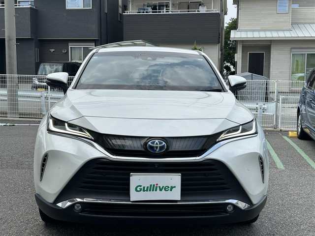トヨタ ハリアー ハイブリッド Z レザーパッケージ 兵庫県 2020(令2)年 4.8万km ホワイトパールクリスタルシャイン ワンオーナー/純正メーカーナビ/フルセグTV/Bluetooth/FM/AM/JBLサウンドシステム/パノラミックビューモニター/ビルトインETC2.0/デジタルインナーミラー/プリクラッシュセーフティ/レーントレーシングアシスト/ブラインドスポットモニター/レーダークルーズコントロール/リヤクロストラフィックアラート/パーキングサポートブレーキ/ヘッドアップディスプレイ/ロードサインアシスト/オートマチックハイビーム/前後クリアランスソナー/先行車発進告知/ステアリングスイッチ/D/N パワーシート/D/N シートヒーター/D/N エアーシート/ステアリングヒーター/レザーシート/LEDヘッドライト/フォグランプ/オートライト/プッシュスタート/電格ミラー/ISOFIX/革巻きステアリング/純正フロアマット/スペアキー/新車時保証書/取扱説明書