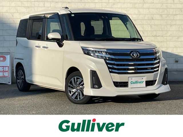 トヨタ ルーミー カスタムG 山口県 2023(令5)年 1.8万km パールホワイトⅢ SDナビ ワンセグTV CD BT/パノラミックビューモニター/両側パワースライドドア/前席シートヒーター/衝突被害軽減ブレーキ/レーダークルーズコントロール/レーンアシスト/オートマチックハイビーム/LEDオートヘッドライト/フォグライト/スマートキー 2個/前後ドラレコ/電動パーキングブレーキ/横滑り防止/ステアリングリモコン/革巻きステアリング/コーナーセンサー/禁煙車