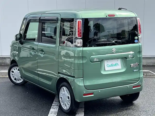 スズキ スペーシア HYBRID X 三重県 2018(平30)年 6.4万km ツールグリーンパールメタリック 4WD/純正ナビ（Bluetooth/DVD/CD/地デジTV/AM/FM/SD）/ETC/両側パワースライドドア/シートヒーター（前席）/スペアキー/セーフティサポート（デュアルセンサーブレーキサポート/誤発進抑制/車線逸脱警報/ふらつき警報/先行車発進お知らせ/ハイビームアシスト/後退時ブレーキサポート/後方誤発進抑制/リアパーキングセンサー）/ブラック内装/光沢アイボリーインパネ加飾/チルトステアリング/オートエアコン/エコクール/リアヒーターダクト/スリムサーキュレーター/ファブリックシート/ボックス付アームレスト(前席中央)/シートリフター(運転席）/ストラップ付左右独立スライドシート（リア）/ロールサンシェード（リアドア）/アクセサリーソケット（後席右側）/ラゲッジルームランプ/後方視界支援ミラー/純正フロアマット