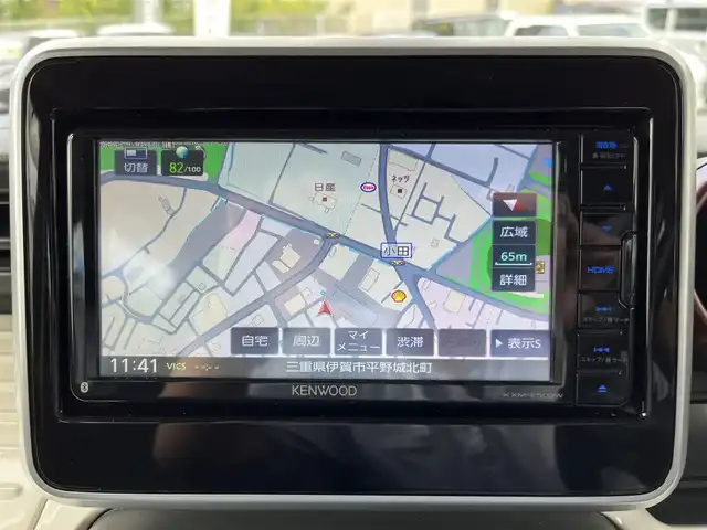 スズキ スペーシア HYBRID X 三重県 2018(平30)年 6.4万km ツールグリーンパールメタリック 4WD/純正ナビ（Bluetooth/DVD/CD/地デジTV/AM/FM/SD）/ETC/両側パワースライドドア/シートヒーター（前席）/スペアキー/セーフティサポート（デュアルセンサーブレーキサポート/誤発進抑制/車線逸脱警報/ふらつき警報/先行車発進お知らせ/ハイビームアシスト/後退時ブレーキサポート/後方誤発進抑制/リアパーキングセンサー）/ブラック内装/光沢アイボリーインパネ加飾/チルトステアリング/オートエアコン/エコクール/リアヒーターダクト/スリムサーキュレーター/ファブリックシート/ボックス付アームレスト(前席中央)/シートリフター(運転席）/ストラップ付左右独立スライドシート（リア）/ロールサンシェード（リアドア）/アクセサリーソケット（後席右側）/ラゲッジルームランプ/後方視界支援ミラー/純正フロアマット