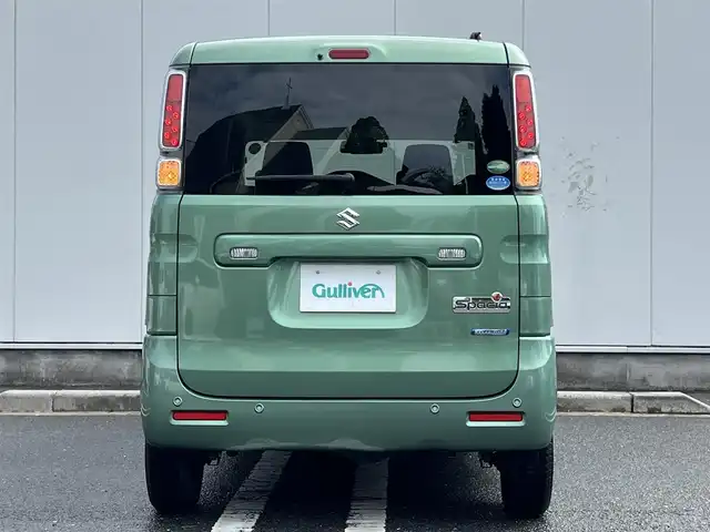 スズキ スペーシア HYBRID X 三重県 2018(平30)年 6.4万km ツールグリーンパールメタリック 4WD/純正ナビ（Bluetooth/DVD/CD/地デジTV/AM/FM/SD）/ETC/両側パワースライドドア/シートヒーター（前席）/スペアキー/セーフティサポート（デュアルセンサーブレーキサポート/誤発進抑制/車線逸脱警報/ふらつき警報/先行車発進お知らせ/ハイビームアシスト/後退時ブレーキサポート/後方誤発進抑制/リアパーキングセンサー）/ブラック内装/光沢アイボリーインパネ加飾/チルトステアリング/オートエアコン/エコクール/リアヒーターダクト/スリムサーキュレーター/ファブリックシート/ボックス付アームレスト(前席中央)/シートリフター(運転席）/ストラップ付左右独立スライドシート（リア）/ロールサンシェード（リアドア）/アクセサリーソケット（後席右側）/ラゲッジルームランプ/後方視界支援ミラー/純正フロアマット