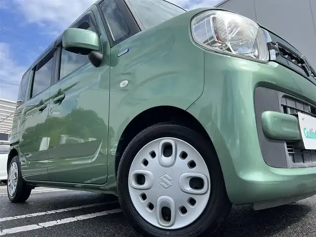 スズキ スペーシア HYBRID X 三重県 2018(平30)年 6.4万km ツールグリーンパールメタリック 4WD/純正ナビ（Bluetooth/DVD/CD/地デジTV/AM/FM/SD）/ETC/両側パワースライドドア/シートヒーター（前席）/スペアキー/セーフティサポート（デュアルセンサーブレーキサポート/誤発進抑制/車線逸脱警報/ふらつき警報/先行車発進お知らせ/ハイビームアシスト/後退時ブレーキサポート/後方誤発進抑制/リアパーキングセンサー）/ブラック内装/光沢アイボリーインパネ加飾/チルトステアリング/オートエアコン/エコクール/リアヒーターダクト/スリムサーキュレーター/ファブリックシート/ボックス付アームレスト(前席中央)/シートリフター(運転席）/ストラップ付左右独立スライドシート（リア）/ロールサンシェード（リアドア）/アクセサリーソケット（後席右側）/ラゲッジルームランプ/後方視界支援ミラー/純正フロアマット