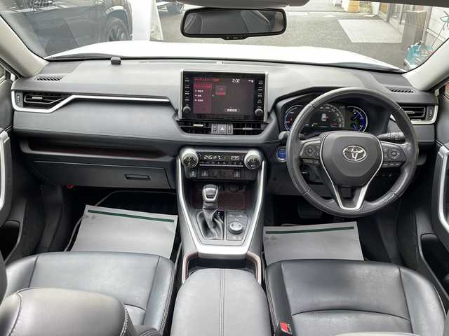 トヨタ ＲＡＶ４ ハイブリットG 神奈川県 2020(令2)年 2.9万km ホワイトパールクリスタルシャイン ワンオーナー/サンルーフ/純正メーカーナビ/(AM/FM/USB/BT/Miracast/フルセグTV)/全方位カメラ/衝突被害軽減ブレーキ/レーンキープアシスト/ブラインドスポットモニター/クリアランスソナー/オートハイビーム/レーダークルーズコントロール/黒革シート/D席メモリー機能付パワーシート/D/N席シートヒーター/ステアリングヒーター/AC100V電源/パワーバックドア/ルーフレール/ビルトインETC2.0/オートミラー/ISOFIX/スペアキー×1/保証書/取扱説明書