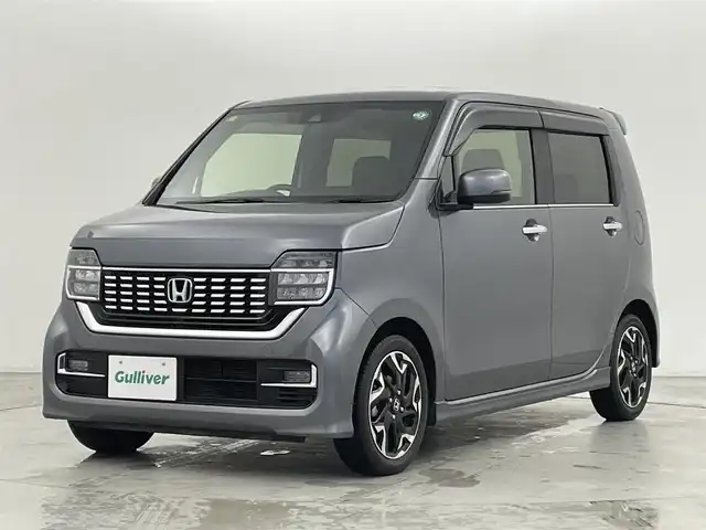 ホンダ Ｎ ＷＧＮ カスタム Lターボ ホンダS 群馬県 2020(令2)年 3.1万km シャイニンググレーM 純正8インチナビ/(AM/FM/Bluetooth/TV/AppleCarPlay)/バックモニター/Honda SENSING/ ・衝突軽減ブレーキ/ ・誤発進抑制機能/後方誤発進抑制機能/ ・歩行者事故低減ステアリング/ ・先行車発進お知らせ機能/ ・標識認識機能/ ・路外逸脱抑制機能/車線維持支援システム/ ・渋滞追従機能付アダプティブクルーズコントロール/ ・オートハイビーム/純正ナビ連動ドライブレコーダー(前後方)/パドルシフト/運転席側シートヒーター/クリアランスソナー/電動パーキングブレーキ/オートブレーキホールド/プッシュスタート/スマートキー(スペアキー1本)