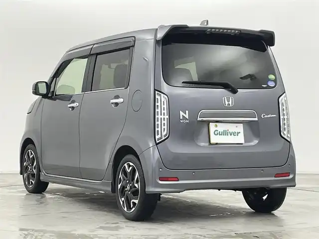 ホンダ Ｎ ＷＧＮ カスタム Lターボ ホンダS 群馬県 2020(令2)年 3.1万km シャイニンググレーM 純正8インチナビ/(AM/FM/Bluetooth/TV/AppleCarPlay)/バックモニター/Honda SENSING/ ・衝突軽減ブレーキ/ ・誤発進抑制機能/後方誤発進抑制機能/ ・歩行者事故低減ステアリング/ ・先行車発進お知らせ機能/ ・標識認識機能/ ・路外逸脱抑制機能/車線維持支援システム/ ・渋滞追従機能付アダプティブクルーズコントロール/ ・オートハイビーム/純正ナビ連動ドライブレコーダー(前後方)/パドルシフト/運転席側シートヒーター/クリアランスソナー/電動パーキングブレーキ/オートブレーキホールド/プッシュスタート/スマートキー(スペアキー1本)