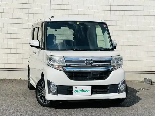 ダイハツ タント カスタム RS SA 大分県 2014(平26)年 8.2万km パールホワイトⅢ ワンオーナー /純正8インチSDナビゲーション(NSZN-W64DB)/【フルセグTV/Bluetooth/DVD/CD/SD】/スマートアシスト/・衝突警報機能/・衝突回避支援ブレーキ機能/・誤発進抑制機能(前方)/・先行車発進お知らせ機能/両側パワースライドドア/バックカメラ/ETC/前後ドライブレコーダー(ZDR-015)/純正15インチアルミホイール/純正フロアマット/純正ドアバイザー/リアサンシェード/ステアリングスイッチ/電動格納ミラー/ウィンカーミラー/シガーソケット/保証書/取扱説明書