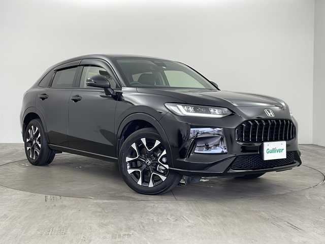 ホンダ ＺＲ－Ｖ ハイブリッド e:HEV Z 兵庫県 2023(令5)年 3.8万km クリスタルブラックパール ・Honda SENSING/・衝突軽減ブレーキ（CMBS）/・先行車発進お知らせ機能/・歩行者事故低減ステアリング/・路外逸脱抑制機能/・標識認識機能/・渋滞追従機能付アダプティブクルーズコントロール（ACC）/・車線維持支援システム（LKAS）/・トラフィックジャムアシスト（渋滞運転支援機能）/・ブラインドスポットインフォメーション/・誤発進抑制機能/・後方誤発進抑制機能/・近距離衝突軽減ブレーキ/・パーキングセンサーシステム/・アダプティブドライビングビーム/・マルチビューカメラシステム/・Honda CONNECTディスプレー/フルセグ/BT/USB/スマホ連携/・ビルトインETC2.0/・パドルシフト/・ステアリングヒーター/・ワイヤレス充電器/・本革シート/・前席パワーシート/・運転席＆助手席シートヒーター/・BOSEプレミアムサウンドシステム(12スピーカー)/・プラズマクラスター/・ハンズフリーアクセスパワーテールゲート/・18インチアルミホイール
