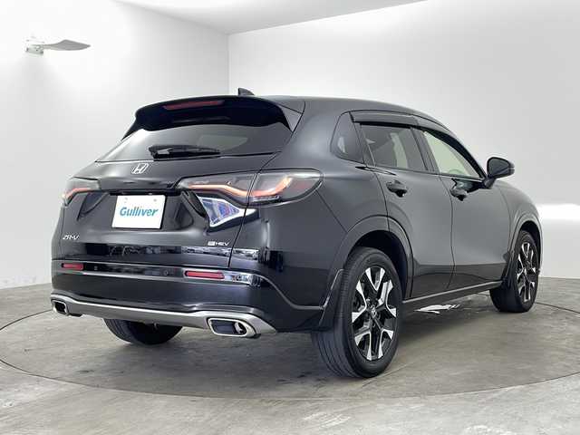 ホンダ ＺＲ－Ｖ ハイブリッド e:HEV Z 兵庫県 2023(令5)年 3.8万km クリスタルブラックパール ・Honda SENSING/・衝突軽減ブレーキ（CMBS）/・先行車発進お知らせ機能/・歩行者事故低減ステアリング/・路外逸脱抑制機能/・標識認識機能/・渋滞追従機能付アダプティブクルーズコントロール（ACC）/・車線維持支援システム（LKAS）/・トラフィックジャムアシスト（渋滞運転支援機能）/・ブラインドスポットインフォメーション/・誤発進抑制機能/・後方誤発進抑制機能/・近距離衝突軽減ブレーキ/・パーキングセンサーシステム/・アダプティブドライビングビーム/・マルチビューカメラシステム/・Honda CONNECTディスプレー/フルセグ/BT/USB/スマホ連携/・ビルトインETC2.0/・パドルシフト/・ステアリングヒーター/・ワイヤレス充電器/・本革シート/・前席パワーシート/・運転席＆助手席シートヒーター/・BOSEプレミアムサウンドシステム(12スピーカー)/・プラズマクラスター/・ハンズフリーアクセスパワーテールゲート/・18インチアルミホイール