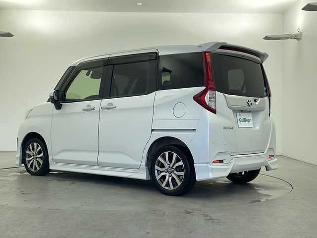 トヨタ ルーミー カスタムG－T 福井県 2018(平30)年 6.4万km パールホワイトⅢ モデリスタエアロ/純正９インチナビ/（フルセグ/BT/CD/DVD）/バックカメラ/両側パワースライドドア/スマートアシスト/衝突回避支援システム/オートハイビーム/LEDオートライト/純正アルミホイール/プッシュスタート/ステアリングスイッチ/フォグランプ/ETC/スマートキー