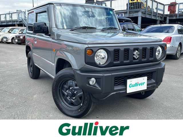 スズキ ジムニー XL 道東・釧路十勝 2024(令6)年 0.5万km ミディアムグレー 4WD/純正ナビ SKX-S808/　(AM/FM/CD/DVD/BT)/シートヒーター/純正16インチAW/純正フロアマット/ドアバイザー/アイドリングストップ/コーナーセンサー/レーンキープアシスト/ダウンヒルアシスト/オートライト/フォグランプ/盗難防止装置/ABS/横滑り防止装置/スペアキー/取扱説明書