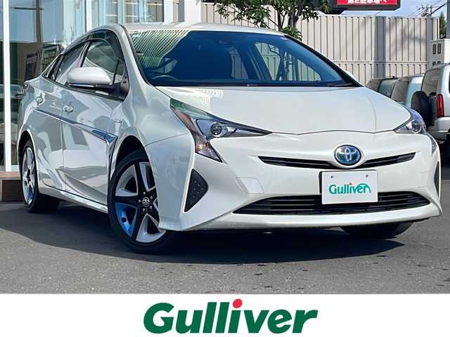 トヨタ プリウス S ツーリングセレクション 道央・札幌 2016(平28)年 5.2万km ホワイトパールクリスタルシャイン ・４WD/・衝突軽減ブレーキ/・レザーシート/・社外メモリナビ/　CD＆DVD＆BT＆TV/・バックカメラ/・レーンキープアシスト/・レーダークルーズコントロール/・オートエアコン/・オートライト/・オートリトラミラー/・シートヒーター/・プッシュスタート/・スマートキー/・オートハイビーム/・社外フロアマット/・ドアバイザー/・LEDヘッドライト