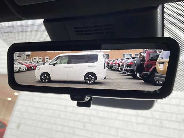 トヨタ ヴォクシー ハイブリッド S－Z 山形県 2023(令5)年 4万km アティチュードブラックマイカ GRエアロ(F/S/R)/トヨタチームメイト/・アドバンストドライブ/・アドバンストパーク/快適便利パッケージHigh/・両側ハンズフリーデュアルパワースライドドア/・パワーバックドア/・ステアリングヒーター/・前席/2列目シートヒーター/・2列目オットマン/・デュアルオートエアコン（ナノイーXあり）/ドライビングサポートパッケージ/・カラーヘッドアップディスプレイ/・デジタルインナーミラー/ディスプレイオーディオプラス/フルセグTV/パノラミックビューモニター/レーダークルーズコントロール/クリアランスソナー/トヨタセーフティセンス/・プリクラッシュセーフティ/・レーントレーシングアシスト/・レーンディパーチャーアラート/・オートマチックハイビーム/・ロードサインアシスト/・ドライバー異常時対応システム/・プロアクティブドライビングアシスト/・発進遅れ告知機能/AC100V電源/パーキングサポートブレーキ(前後静止物)/LEDヘッドランプ/革巻きステアリング/ステアリングスイッチ/ビルトインETC2.0/合皮/ファブリックコンビシート/スマートエントリー/スタートシステム/禁煙車