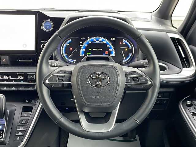 トヨタ ヴォクシー ハイブリッド S－Z 山形県 2023(令5)年 4万km アティチュードブラックマイカ GRエアロ(F/S/R)/トヨタチームメイト/・アドバンストドライブ/・アドバンストパーク/快適便利パッケージHigh/・両側ハンズフリーデュアルパワースライドドア/・パワーバックドア/・ステアリングヒーター/・前席/2列目シートヒーター/・2列目オットマン/・デュアルオートエアコン（ナノイーXあり）/ドライビングサポートパッケージ/・カラーヘッドアップディスプレイ/・デジタルインナーミラー/ディスプレイオーディオプラス/フルセグTV/パノラミックビューモニター/レーダークルーズコントロール/クリアランスソナー/トヨタセーフティセンス/・プリクラッシュセーフティ/・レーントレーシングアシスト/・レーンディパーチャーアラート/・オートマチックハイビーム/・ロードサインアシスト/・ドライバー異常時対応システム/・プロアクティブドライビングアシスト/・発進遅れ告知機能/AC100V電源/パーキングサポートブレーキ(前後静止物)/LEDヘッドランプ/革巻きステアリング/ステアリングスイッチ/ビルトインETC2.0/合皮/ファブリックコンビシート/スマートエントリー/スタートシステム/禁煙車
