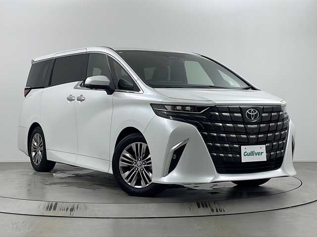 トヨタ アルファードハイブリット Z 埼玉県 2024(令6)年 0.5万km プラチナホワイトパールマイカ ユニバーサルステップ　/純正ディスプレイオーディオ　/全方位カメラ　/ＢＳＭ　/ワイヤレス充電器　/前後ドライブレコーダー　/ビルトインＥＴＣ２．０　/メモリ付きパワーシート/シートヒーター/エアシート/ステアリングヒーター/電動リアゲート　/レーダークルーズコントロール/アドバンストパーク＋PKSB/パドルシフト/オットマン/両側パワースライドドア/純正アルミホイール/純正フロアマット/LEDヘッドライト/オートマティックハイビーム/フォグランプ