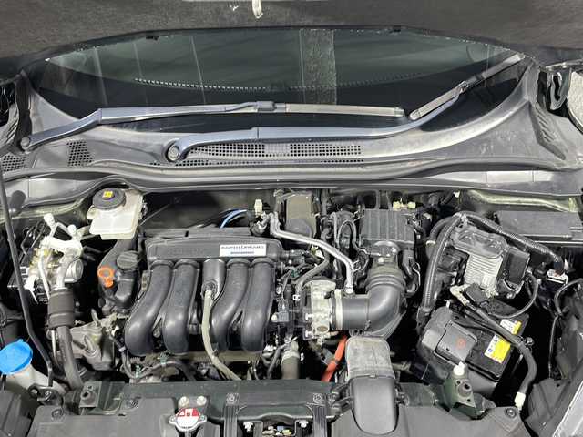 ホンダ ヴェゼル ハイブリッド Z 沖縄県 2014(平26)年 7.9万km ミスティックグリーンパール 県外仕入　/禁煙車　/純正７インチナビ[VXM155VFi]/（ＢＴ，フルセグ，ＣＤ／ＤＶＤ，ラジオ）　/バックカメラ　/ルーフレール　/ハーフレザーシート　/運転席シートヒーター　/クルーズコントロール　/パドルシフト　/オートライト　/ETC/純正フロアマット/純正ドアバイザー/電子パーキングブレーキ/ＬＥＤヘッドライト/純正17インチアルミホイール