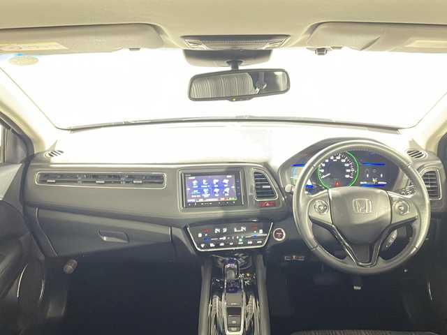 ホンダ ヴェゼル ハイブリッド Z 沖縄県 2014(平26)年 7.9万km ミスティックグリーンパール 県外仕入　/禁煙車　/純正７インチナビ[VXM155VFi]/（ＢＴ，フルセグ，ＣＤ／ＤＶＤ，ラジオ）　/バックカメラ　/ルーフレール　/ハーフレザーシート　/運転席シートヒーター　/クルーズコントロール　/パドルシフト　/オートライト　/ETC/純正フロアマット/純正ドアバイザー/電子パーキングブレーキ/ＬＥＤヘッドライト/純正17インチアルミホイール