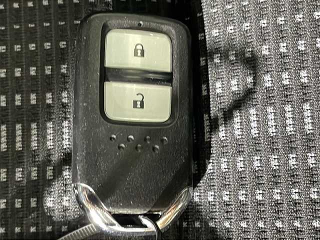 ホンダ ヴェゼル ハイブリッド Z 沖縄県 2014(平26)年 7.9万km ミスティックグリーンパール 県外仕入　/禁煙車　/純正７インチナビ[VXM155VFi]/（ＢＴ，フルセグ，ＣＤ／ＤＶＤ，ラジオ）　/バックカメラ　/ルーフレール　/ハーフレザーシート　/運転席シートヒーター　/クルーズコントロール　/パドルシフト　/オートライト　/ETC/純正フロアマット/純正ドアバイザー/電子パーキングブレーキ/ＬＥＤヘッドライト/純正17インチアルミホイール