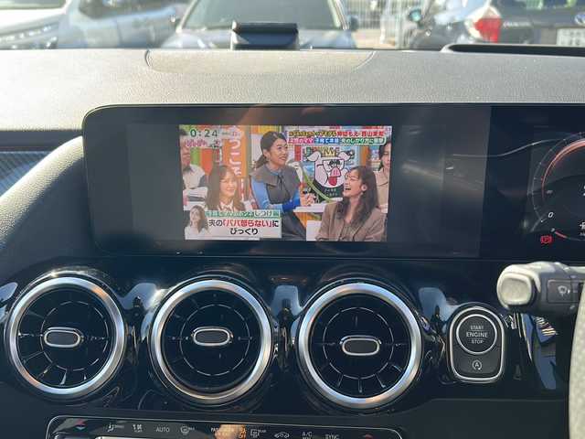 メルセデス・ベンツ Ｂ２００ｄ AMGライン 東京都 2021(令3)年 2.1万km ポーラホワイト 純正メーカーナビ/【TV/Bluetooth/USB/AM/FM】/全方位カメラ/ETC2.0/D/Nシートヒーター/D/N席パワーシート/D/N席メモリーシート/アクティブステアリングアシスト/マルチビームLED/アクティブブレーキアシスト/アクティブレーンキープアシスト/ヘッドアップディスプレイ/アクティブパーキングアシスト/ブラインドスポットモニター/サンルーフ/レーダークルーズコントロール/パドルシフト/電動リアゲート/置くだけ充電