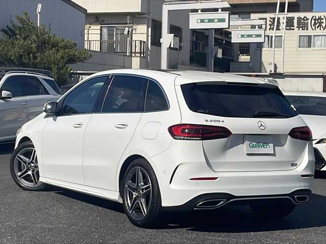 メルセデス・ベンツ Ｂ２００ｄ AMGライン 東京都 2021(令3)年 2.1万km ポーラホワイト 純正メーカーナビ/フルセグ/全方位カメラ/サンルーフ/レーダークルーズコントロール/シートヒーター/パワーシート/席メモリーシート/アクティブステアリングアシスト/マルチビームLED/アクティブレーンキープアシスト/ヘッドアップディスプレイ/アクティブパーキングアシスト/ブラインドスポットモニター/パドルシフト/電動リアゲート/置くだけ充電