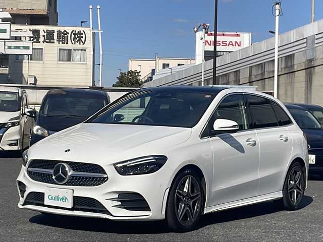 メルセデス・ベンツ Ｂ２００ｄ AMGライン 東京都 2021(令3)年 2.1万km ポーラホワイト 純正メーカーナビ/フルセグ/全方位カメラ/サンルーフ/レーダークルーズコントロール/シートヒーター/パワーシート/席メモリーシート/アクティブステアリングアシスト/マルチビームLED/アクティブレーンキープアシスト/ヘッドアップディスプレイ/アクティブパーキングアシスト/ブラインドスポットモニター/パドルシフト/電動リアゲート/置くだけ充電