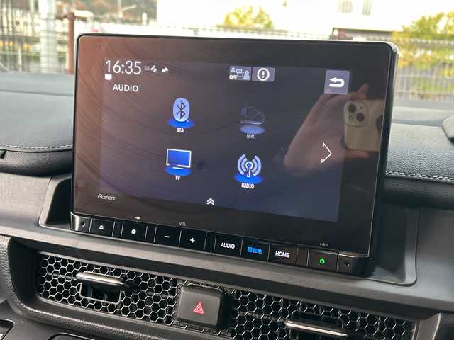 ホンダ ステップワゴン スパーダ eHEV 広島県 2023(令5)年 4.2万km クリスタルブラックパール 禁煙/ホンダセンシング/●衝突軽減ブレーキ（CMBS）/●誤発進抑制機能/●後方誤発進抑制機能/●近距離衝突軽減ブレーキ/●歩行者事故低減ステアリング/●路外逸脱抑制機能/●渋滞追従機能付アダプティブクルーズコントロール（ACC）/●車線維持支援システム（LKAS）/●トラフィックジャムアシスト（渋滞運転支援機能）/●先行車発進お知らせ機能/●標識認識機能/●オートハイビーム/●アダプティブドライビングビーム/BSi/コーナーセンサー/純正９型ナビ（LXM-237VFNi）/・フルセグTV/CD/DVD/Bluetooth/MusicRack/スマホ連携/USB/バックカメラ/両側パワースライドドア/ステアリングスイッチ/革巻きステアリング/パワーテールゲート/コンビシート/前席シートヒーター/２列目オットマン/減速セレクター/電動パーキングブレーキ/ブレーキホールド/トリプルゾーンエアコン/LEDアクティブコーナリングライト/LEDフォグランプ/ETC２．０/フロアマット/１６インチアルミホイール