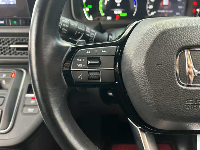 ホンダ ステップワゴン スパーダ eHEV 広島県 2023(令5)年 4.2万km クリスタルブラックパール 禁煙/ホンダセンシング/●衝突軽減ブレーキ（CMBS）/●誤発進抑制機能/●後方誤発進抑制機能/●近距離衝突軽減ブレーキ/●歩行者事故低減ステアリング/●路外逸脱抑制機能/●渋滞追従機能付アダプティブクルーズコントロール（ACC）/●車線維持支援システム（LKAS）/●トラフィックジャムアシスト（渋滞運転支援機能）/●先行車発進お知らせ機能/●標識認識機能/●オートハイビーム/●アダプティブドライビングビーム/BSi/コーナーセンサー/純正９型ナビ（LXM-237VFNi）/・フルセグTV/CD/DVD/Bluetooth/MusicRack/スマホ連携/USB/バックカメラ/両側パワースライドドア/ステアリングスイッチ/革巻きステアリング/パワーテールゲート/コンビシート/前席シートヒーター/２列目オットマン/減速セレクター/電動パーキングブレーキ/ブレーキホールド/トリプルゾーンエアコン/LEDアクティブコーナリングライト/LEDフォグランプ/ETC２．０/フロアマット/１６インチアルミホイール