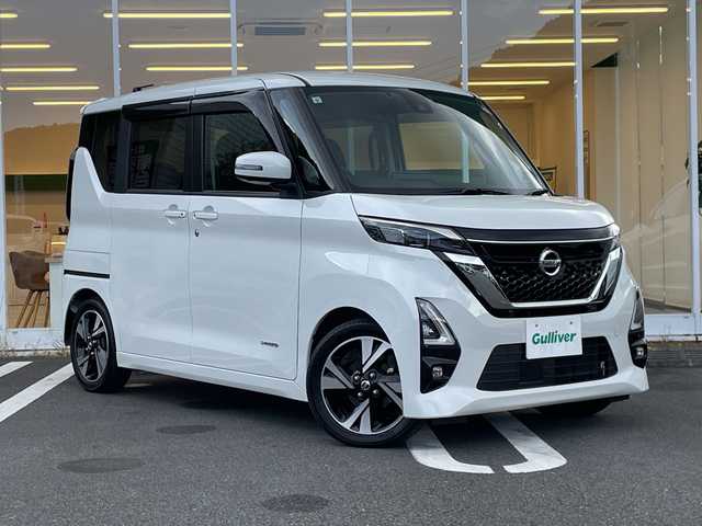 日産 ルークス HWS Gターボ プロパイロットED 愛媛県 2021(令3)年 1万km ホワイトパール 純正9インチメモリーナビ/・Bluetooth/・DVD/CD再生機能　/フルセグTV/両側パワースライドドア/アラウンドビューモニター/ETC/エマージェンシーブレーキ/プロパイロット/インテリジェントクルーズコントロール/速度標識表示/道路標識表示/オートライト/オートマチックハイビーム/LEDヘッドライト/フォグライト/コーナーセンサー/純正15インチアルミホイル/革巻きステアリング/ステアリングスイッチ/インテリジェントキー/プッシュスタート