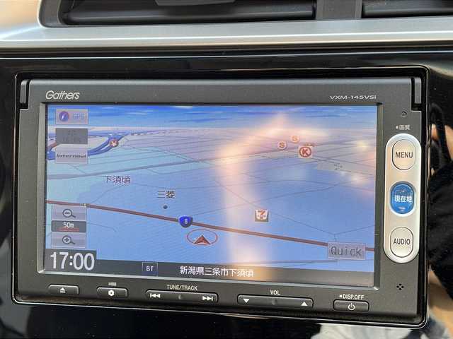 ホンダ フィット 13G Lパッケージ 新潟県 2013(平25)年 7.1万km プレミアムホワイトパール ４WD/純正メモリーナビ/(BT/AM/FM/ワンセグTV)/バックカメラ/社外15インチアルミ/ETC/電格ミラー/プッシュスタートエンジン/純正フロアマット/保証書/スペアキー