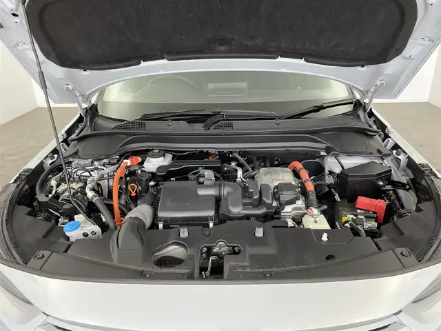 ホンダ ヴェゼル ハイブリッド e:HEV Z 大分県 2022(令4)年 5.1万km プレミアムサンライトホワイトパール ホンダセンシング/・衝突軽減ブレーキ/・渋滞追従機能付アダプティブクルーズコントロール/・車線維持支援システム/・路外逸脱抑制機能/・パーキングセンサーシステム/・オートハイビーム/・誤発進抑制機能/後方誤発進抑制機能/・先行車発進お知らせ機能/・歩行者事故低減ステアリング/・標識認識機能/純正ナビ/（フルセグ/CD/Bluetooth/AM/FM/carplay)/バックカメラ/パワーテールゲート/LEDヘッドライト/ハーフレザーシート/前席シートヒーター/ステアリングヒーター/パドルシフト/オートブレーキホールド/電動パーキングブレーキ/純正18インチアルミホイール/ETC2.0/保証書・取扱説明書
