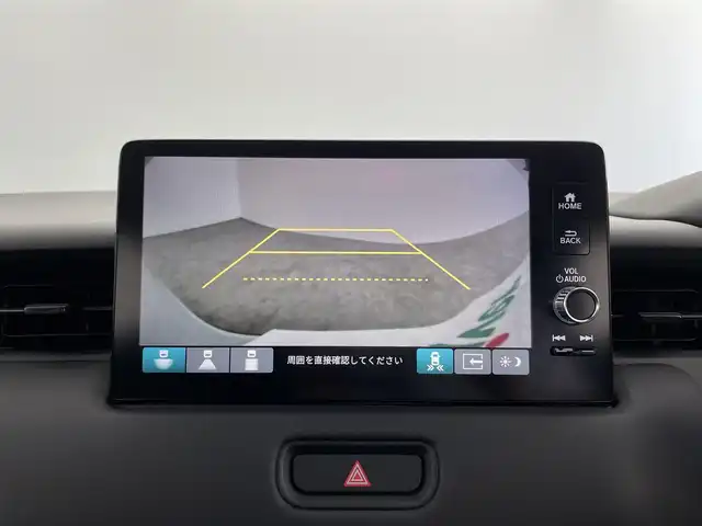 ホンダ ヴェゼル ハイブリッド e:HEV Z 大分県 2022(令4)年 5.1万km プレミアムサンライトホワイトパール ホンダセンシング/・衝突軽減ブレーキ/・渋滞追従機能付アダプティブクルーズコントロール/・車線維持支援システム/・路外逸脱抑制機能/・パーキングセンサーシステム/・オートハイビーム/・誤発進抑制機能/後方誤発進抑制機能/・先行車発進お知らせ機能/・歩行者事故低減ステアリング/・標識認識機能/純正ナビ/（フルセグ/CD/Bluetooth/AM/FM/carplay)/バックカメラ/パワーテールゲート/LEDヘッドライト/ハーフレザーシート/前席シートヒーター/ステアリングヒーター/パドルシフト/オートブレーキホールド/電動パーキングブレーキ/純正18インチアルミホイール/ETC2.0/保証書・取扱説明書